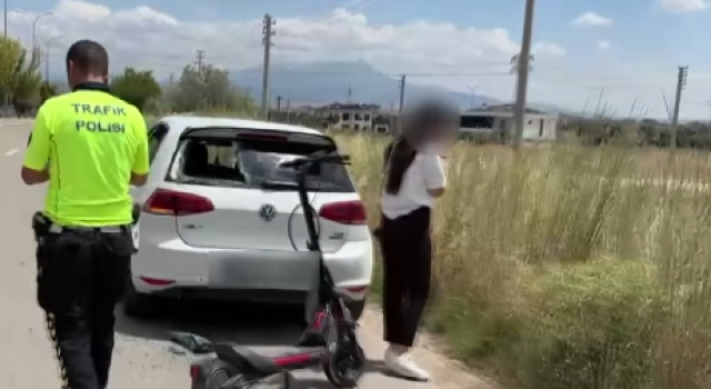Başını Çarptığı Otomobilin Arka Camını Kırdı